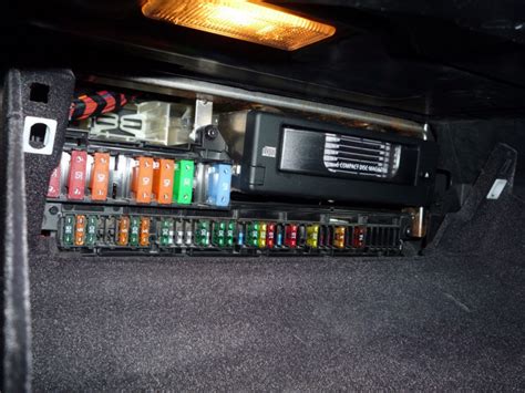 You need to remove the plastic cover to gain access. . Bmw e60 trunk fuse